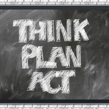 A blackboard with the words: Think, Plan, Act.